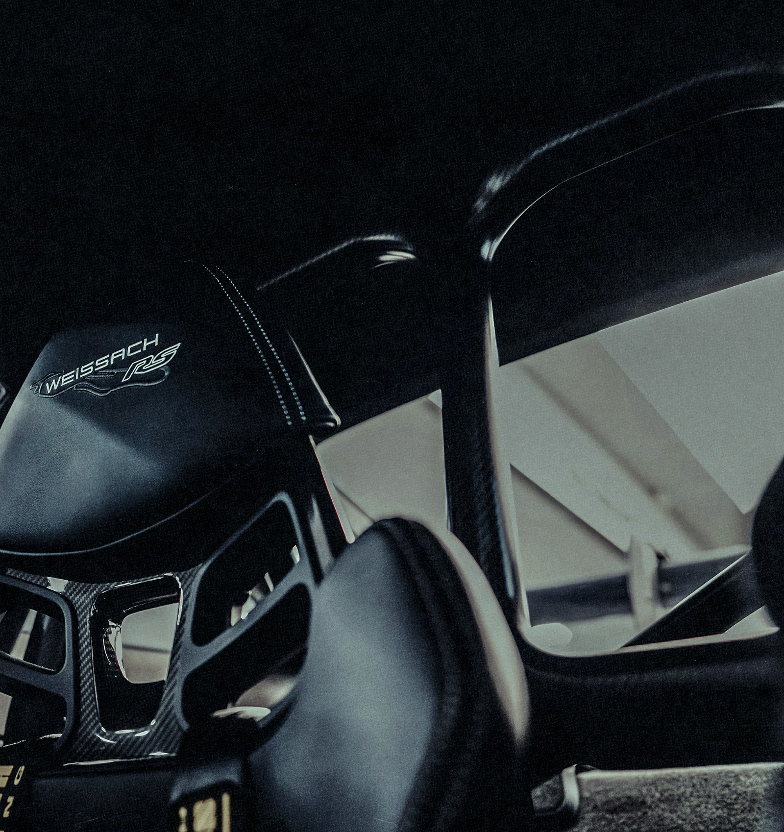 Race car roll cage and bucket seat
